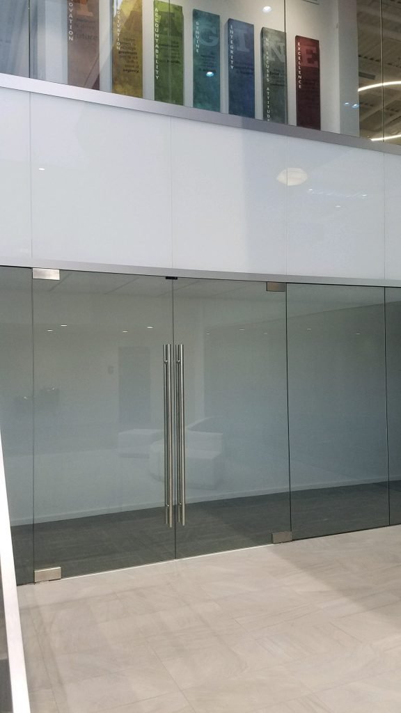 Curved glass storefront doors at commercial building