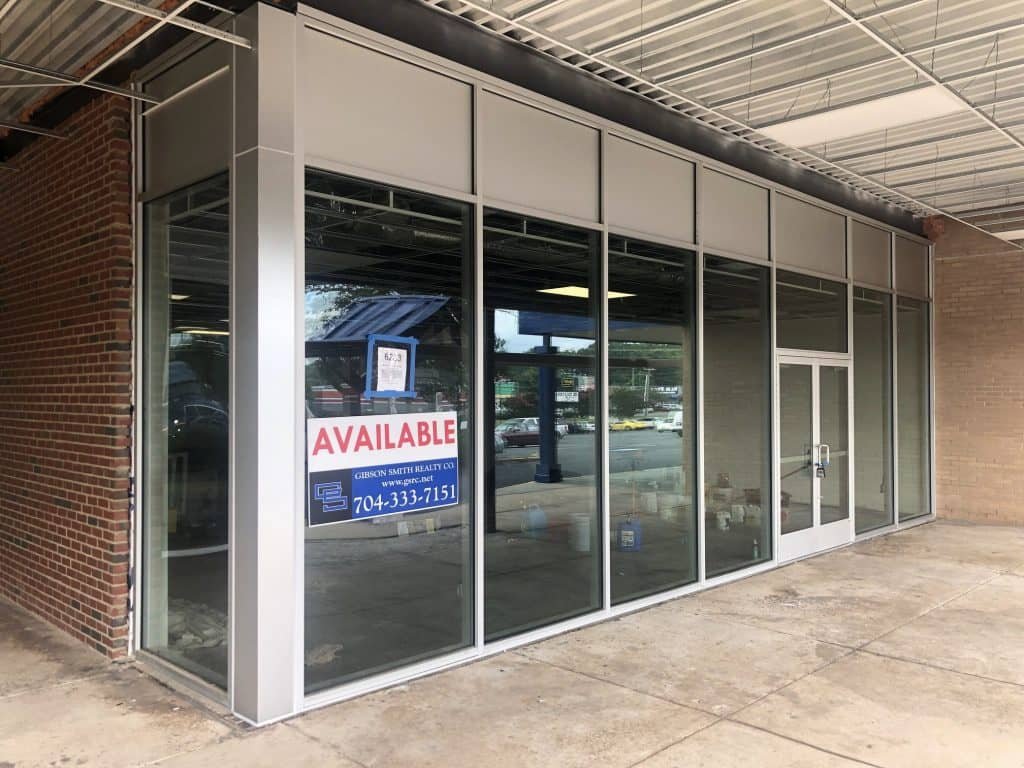 Glass storefront doors in modern structure